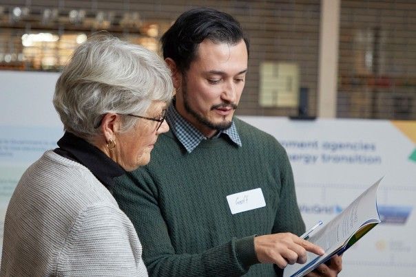 Woman speaking to VicGrid team member