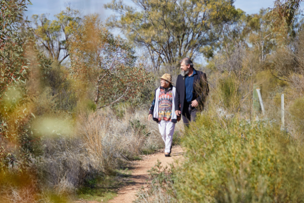 Image of two people walking at Red Cliffs in Mildura