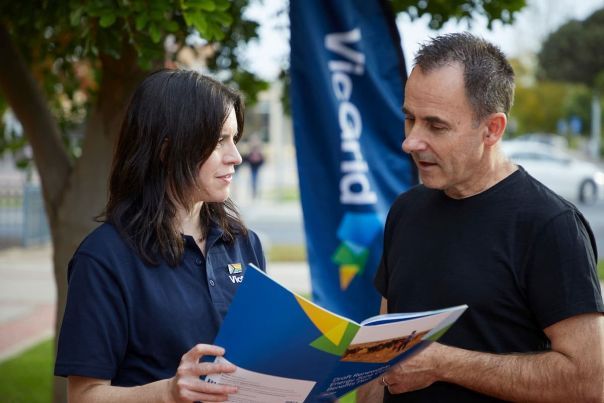 VicGrid team member engaging with a member of the community